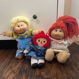 Cabbage patch kids and raggedy Ann doll